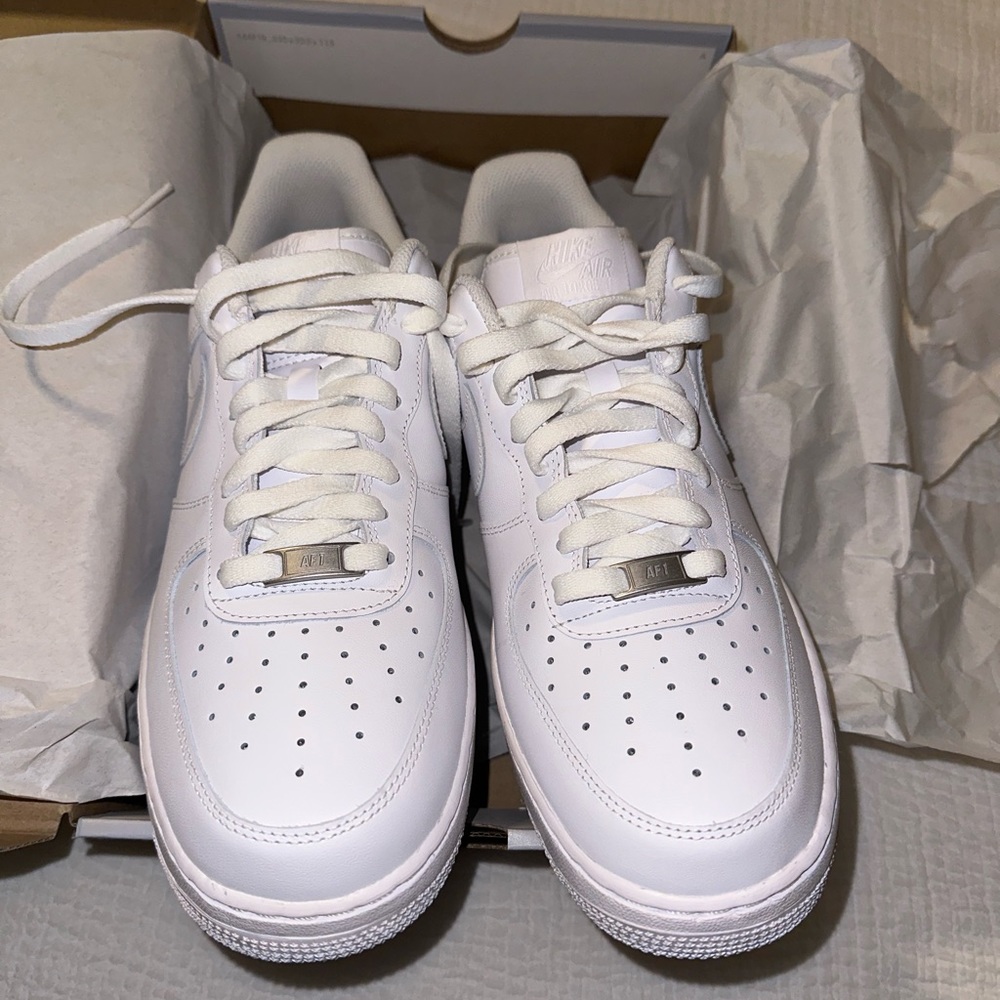 All white Nike “Uptowns”